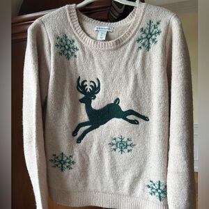 New this season, oatmeal shade sweater with reindeer/snowflakes